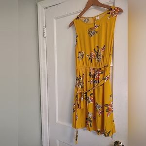Yellow floral sleeveless midi dress with tie waist and keyhole back